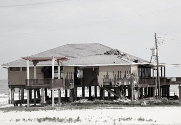 wind damage - spray foam can help prevent uplift to Pompano roofs